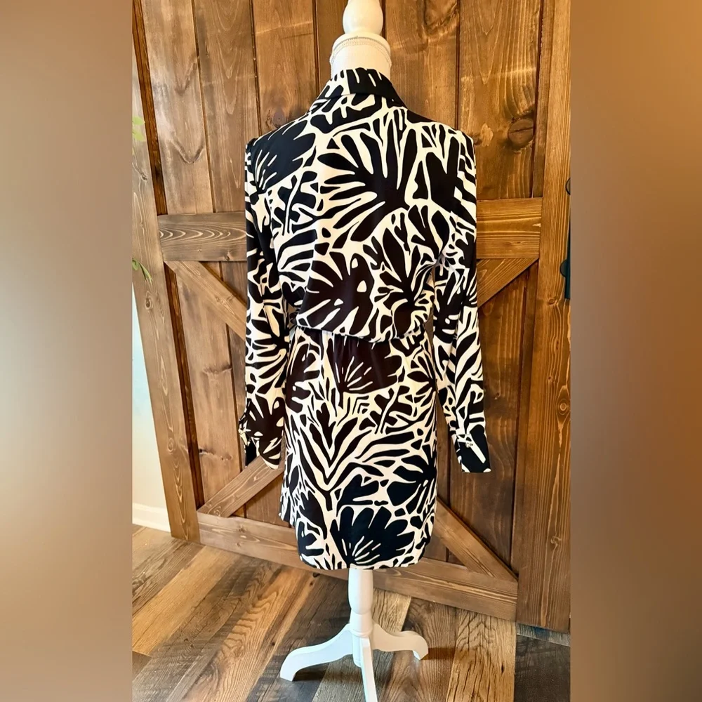 Elegant Black and White Wrap Dress - Picture 2 of 3